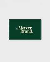 A dark green The Mercer Brand Digital Giftcard (USD) featuring the text The Mercer Brand. in cream-colored lettering.
