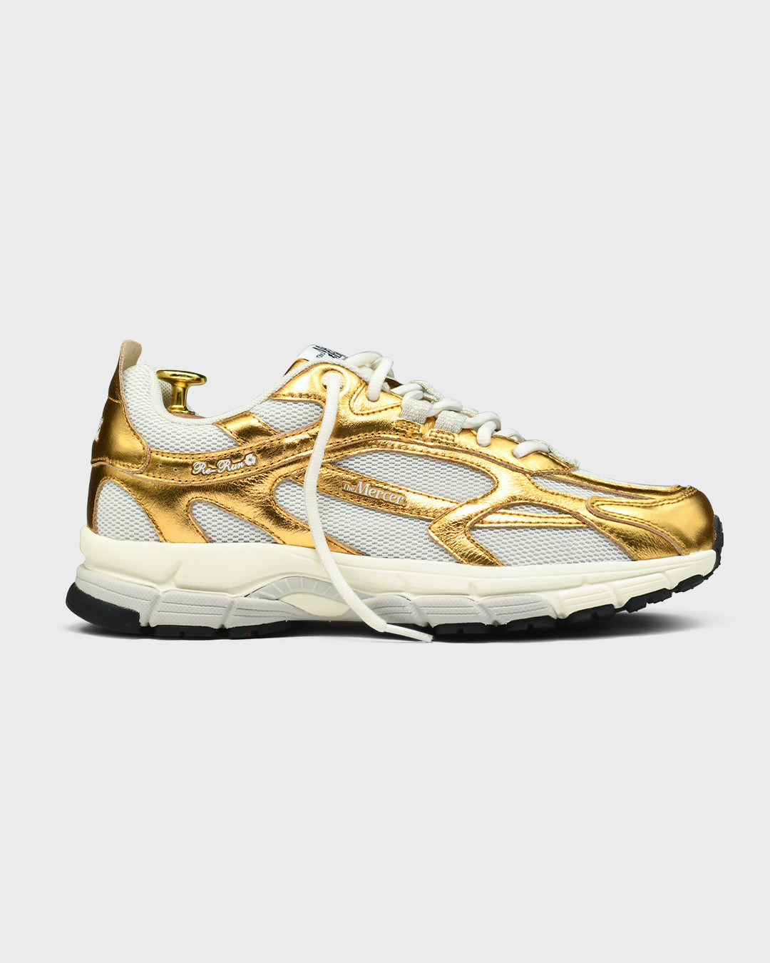 the mercer brand sneaker the re-run pine gold with off white details for women 