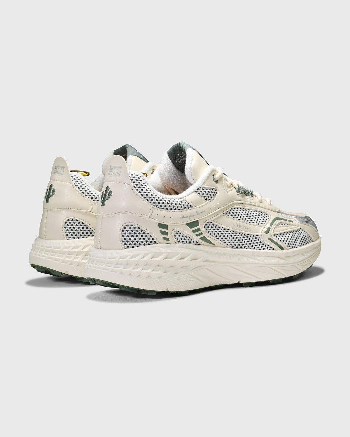 the mercer brand sneaker the re-run cactus white with green details 