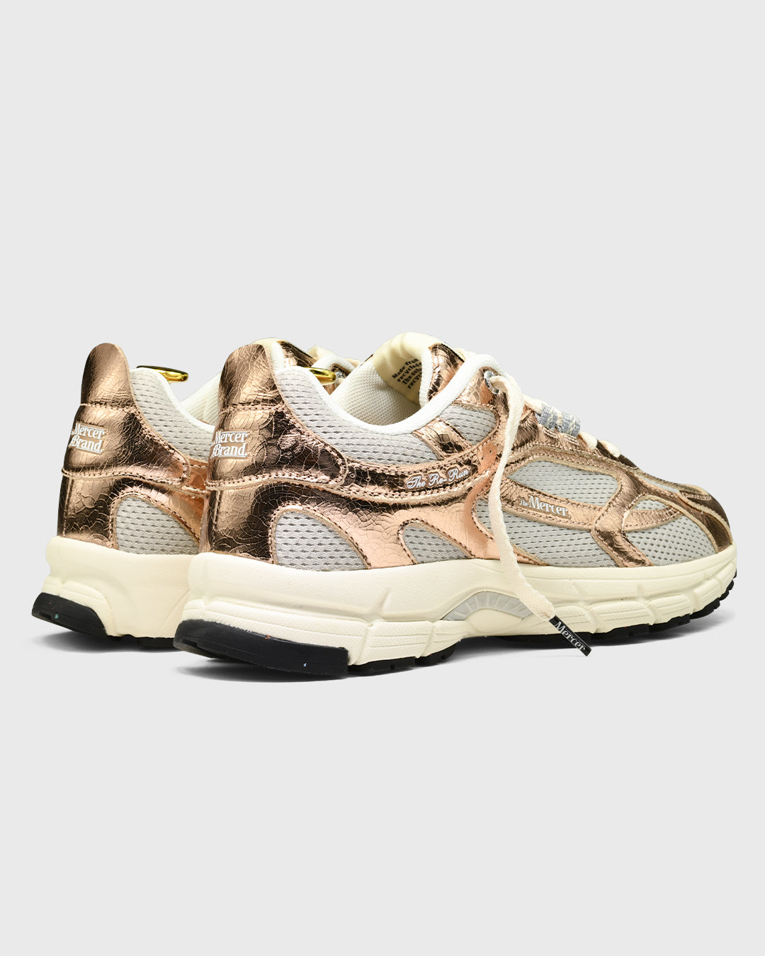 the mercer brand re-run cracked pink with grey details and off white outsole product picture 