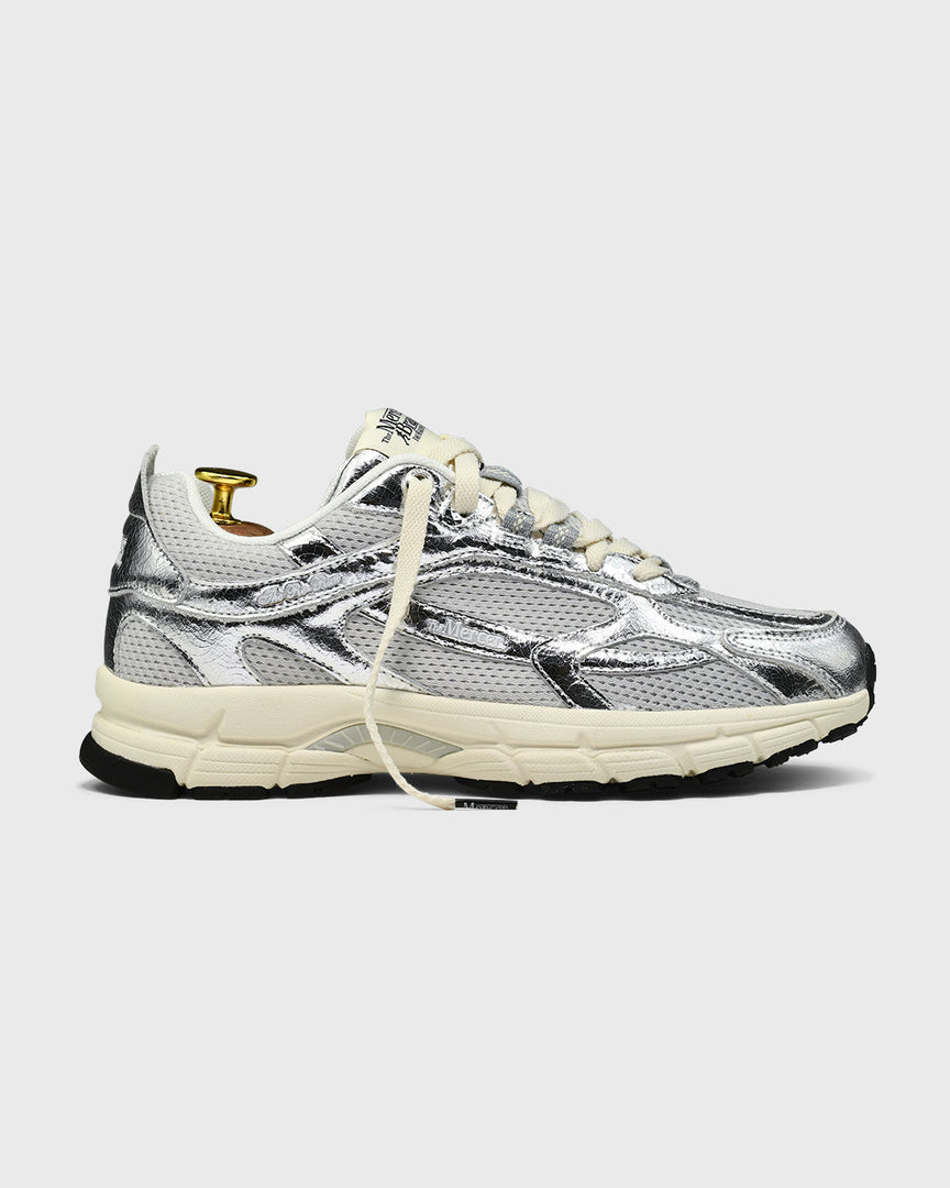 the mercer brand sneaker the re-run cracked silver with off white outsole