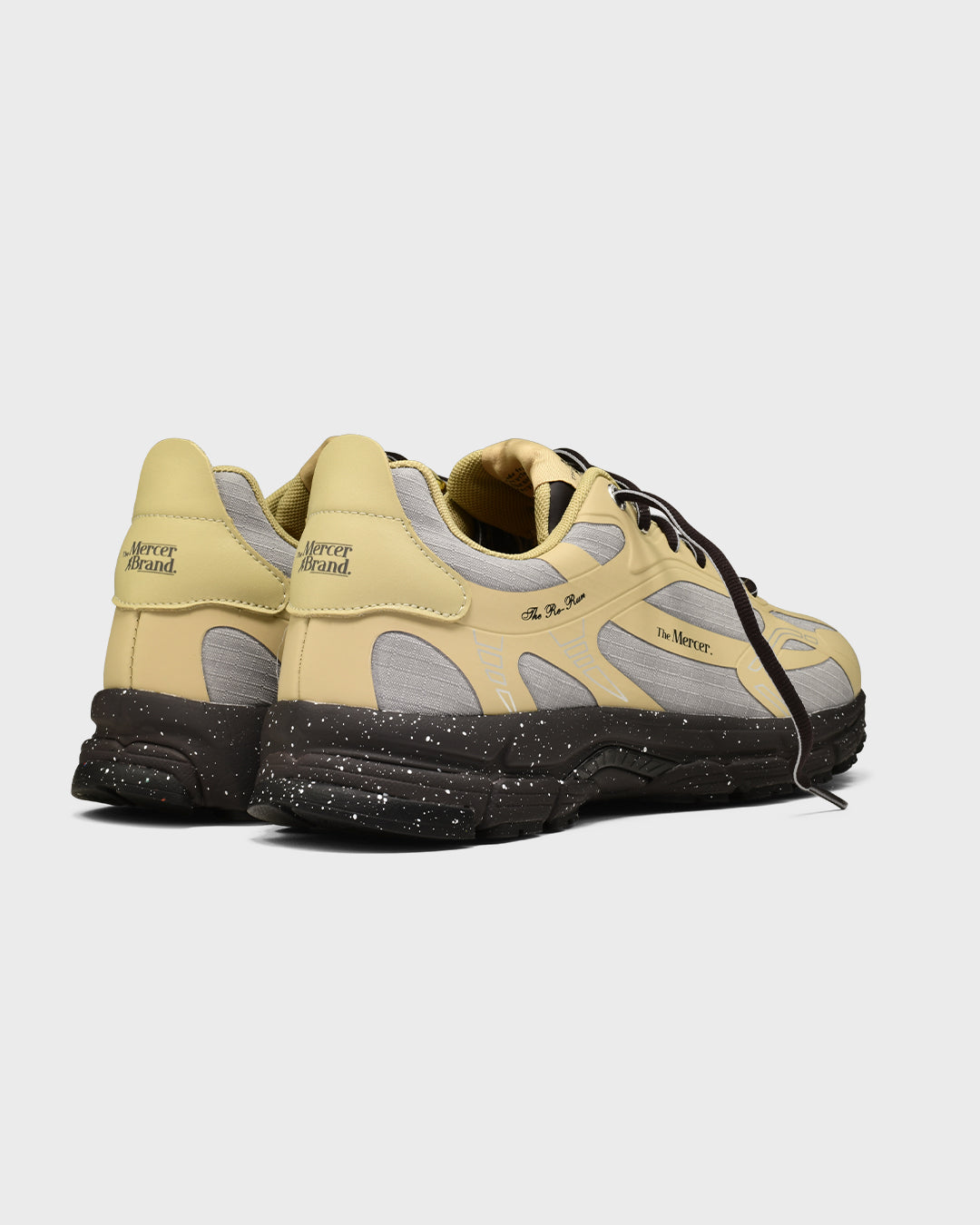 the mercer brand the re-run outdoor sneaker cream with dark details and water repellent upper back side
