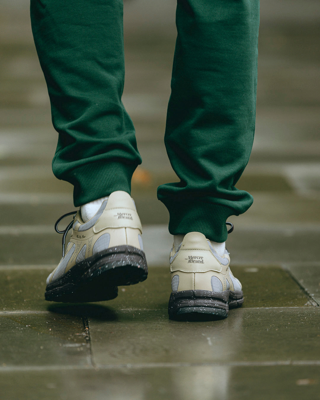 the mercer brand the re-run outdoor sneaker cream with dark details and water repellent upper back for men