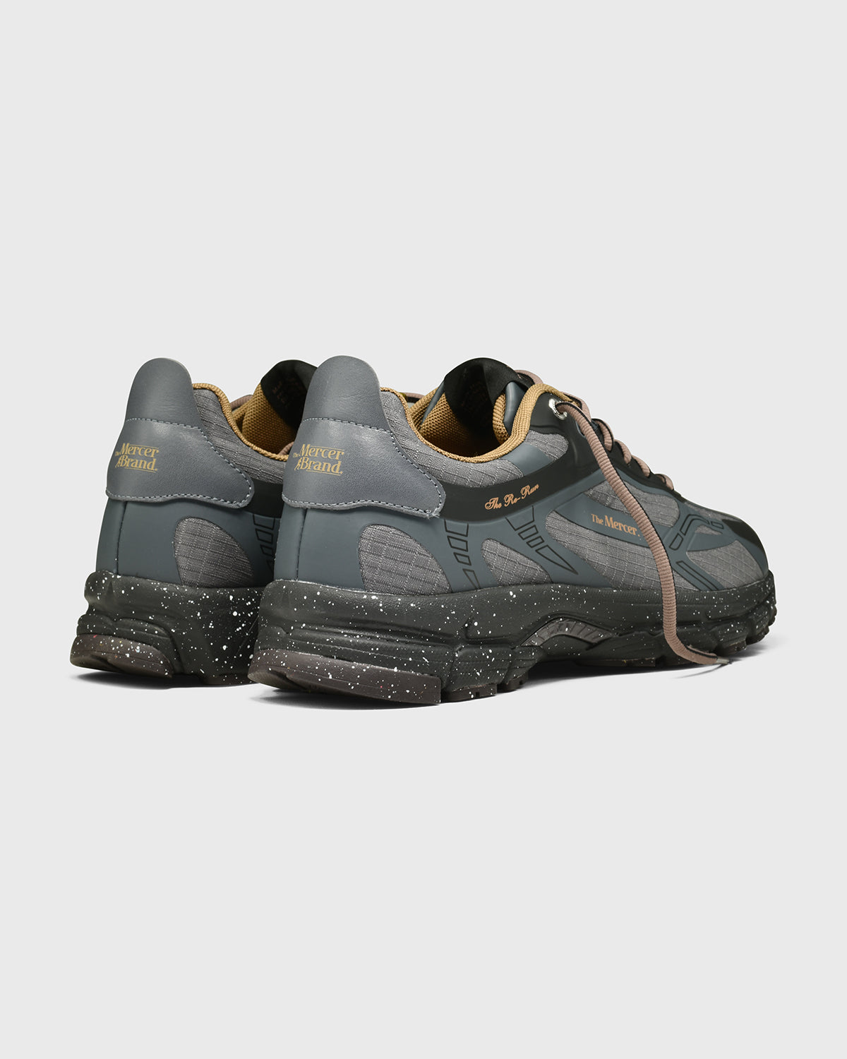 the mercer brand sneaker the re-run outdoor black with cream details water repellent 