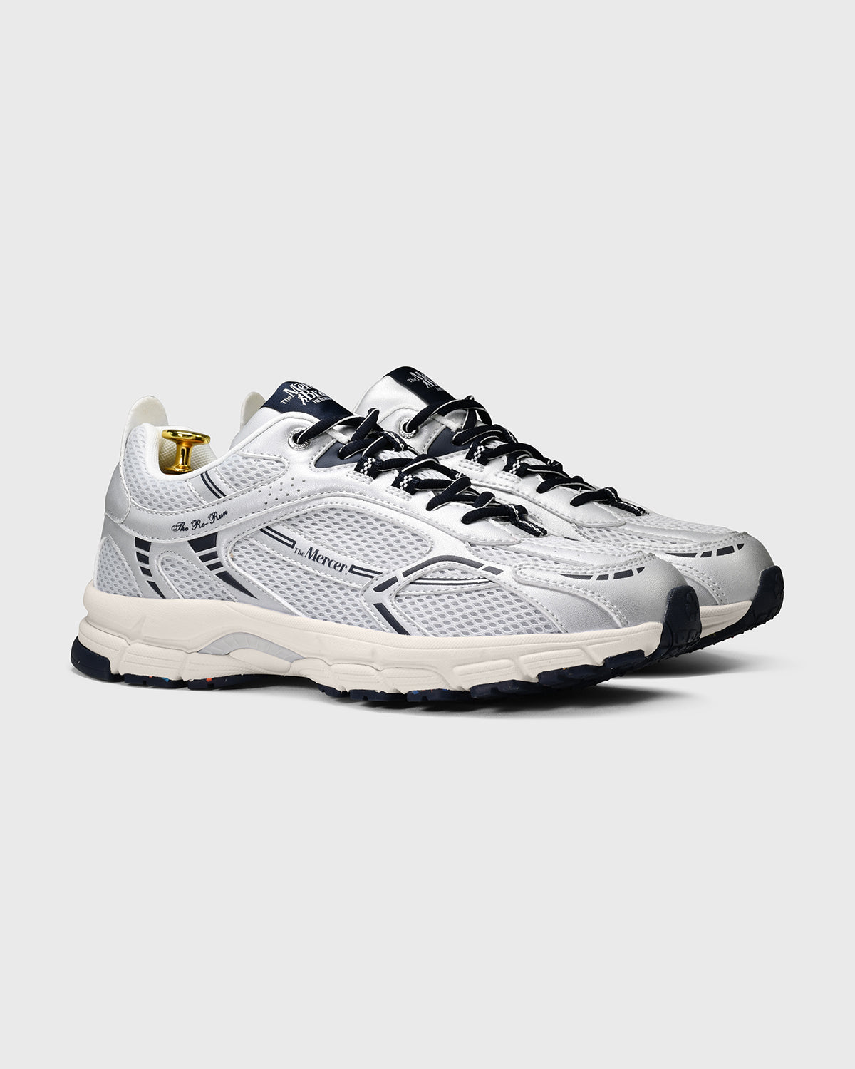 the mercer brand sneaker the re-run speed silver with navy details fully vegan sneaker