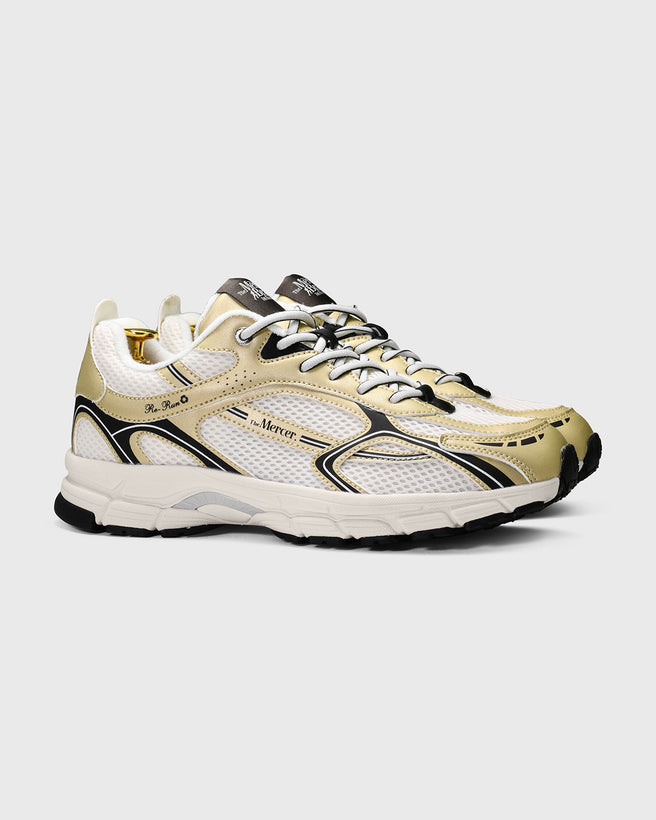 The Mercer Brand re-run sneaker speed gold with black details product photo side