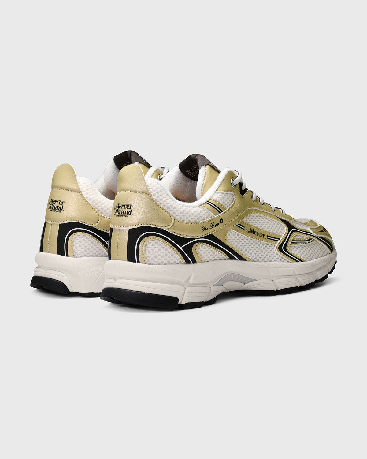 The Mercer Brand re-run sneaker speed gold with black details product photo back