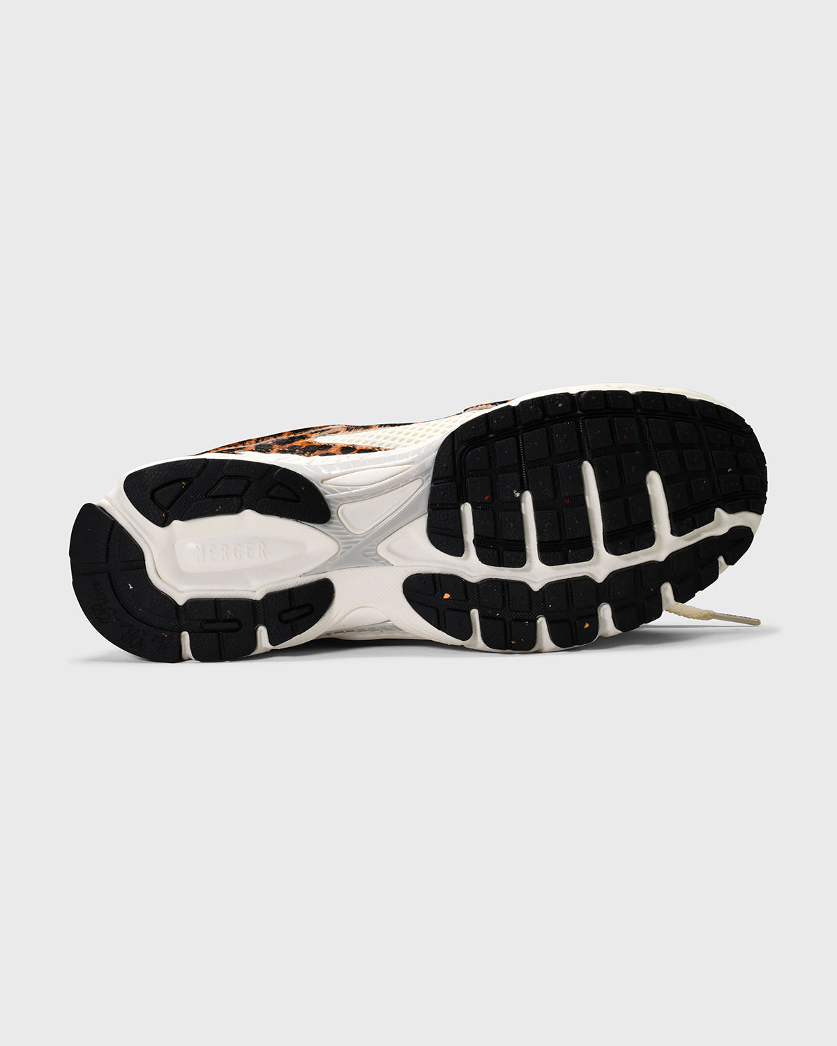 the mercer brand sneaker the re-run leopard with off white mesh and outsole