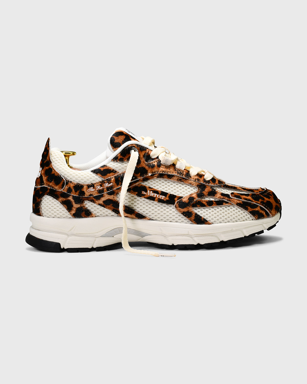 the mercer brand sneaker the re-run leopard with off white mesh and outsole