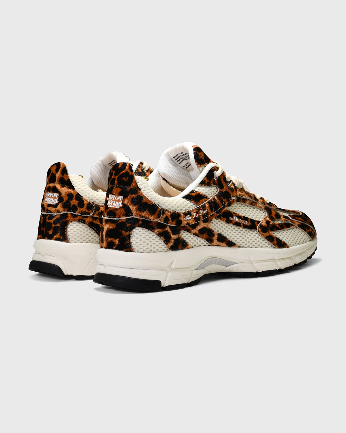 the mercer brand sneaker the re-run leopard with off white mesh and outsole