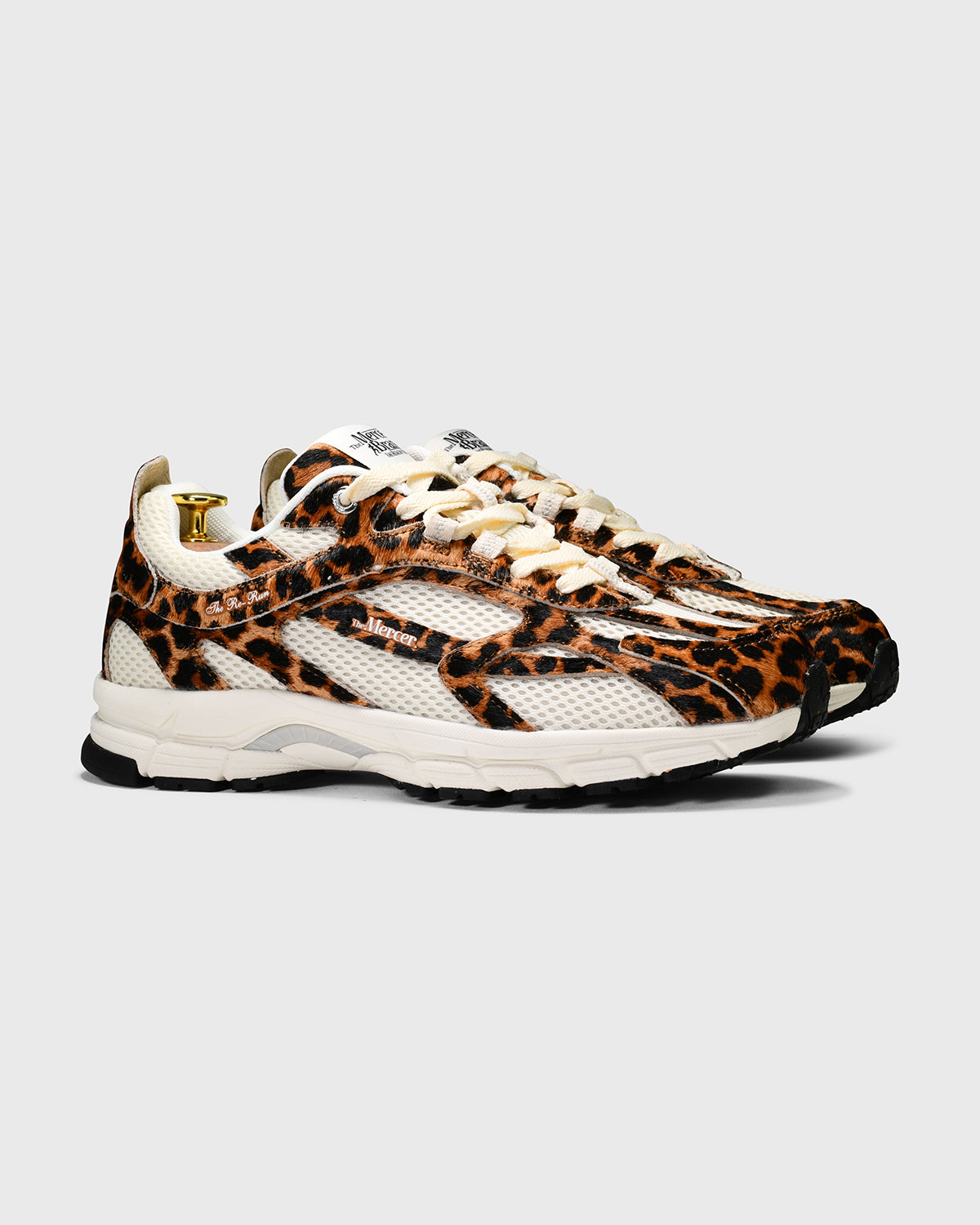 the mercer brand sneaker the re-run leopard with off white mesh and outsole