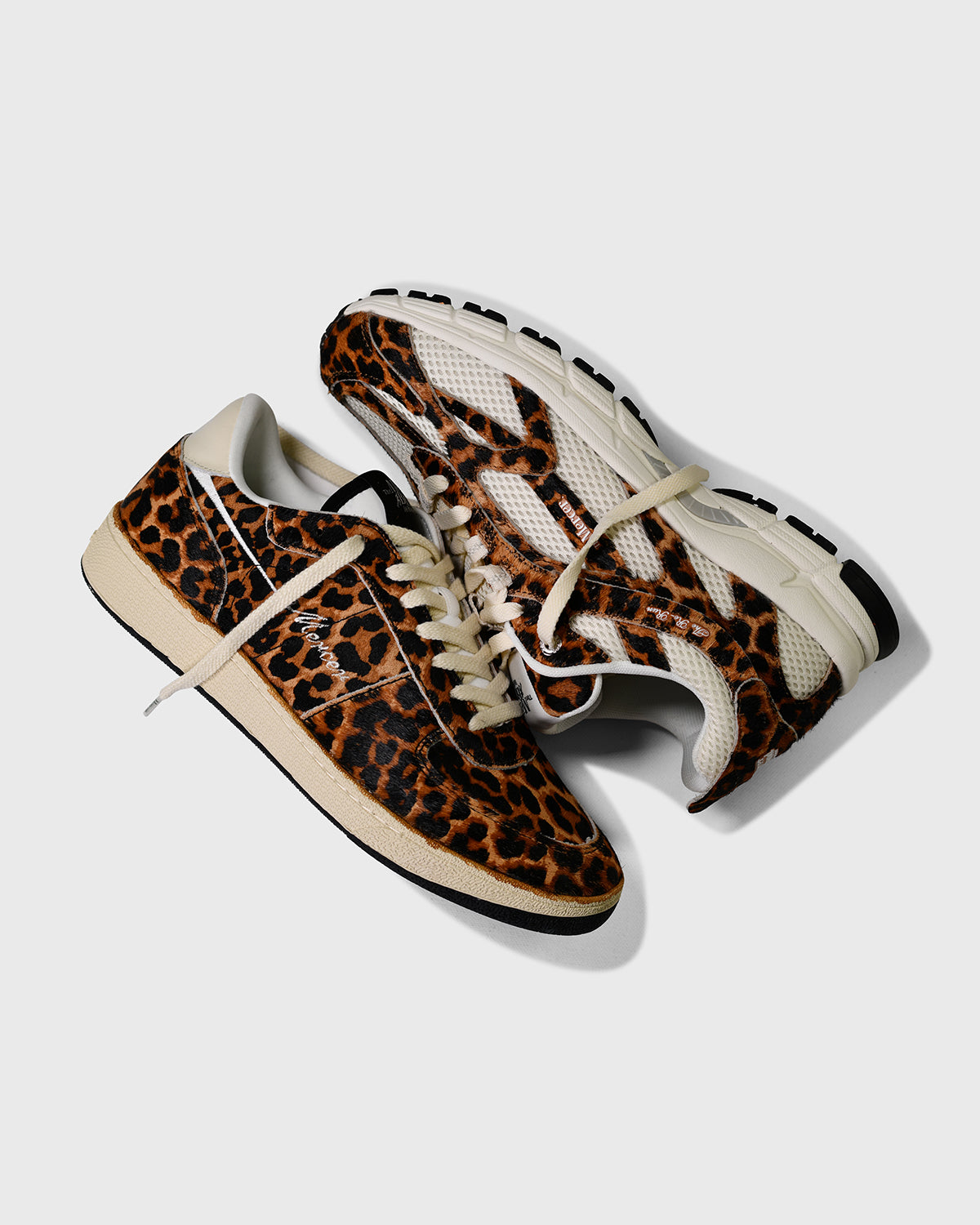 the mercer brand sneaker the re-run leopard with off white mesh and outsole