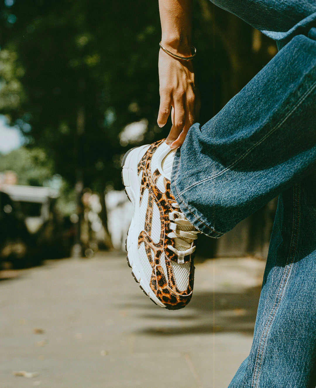 the mercer brand sneaker the re-run leopard with off white mesh and outsole
