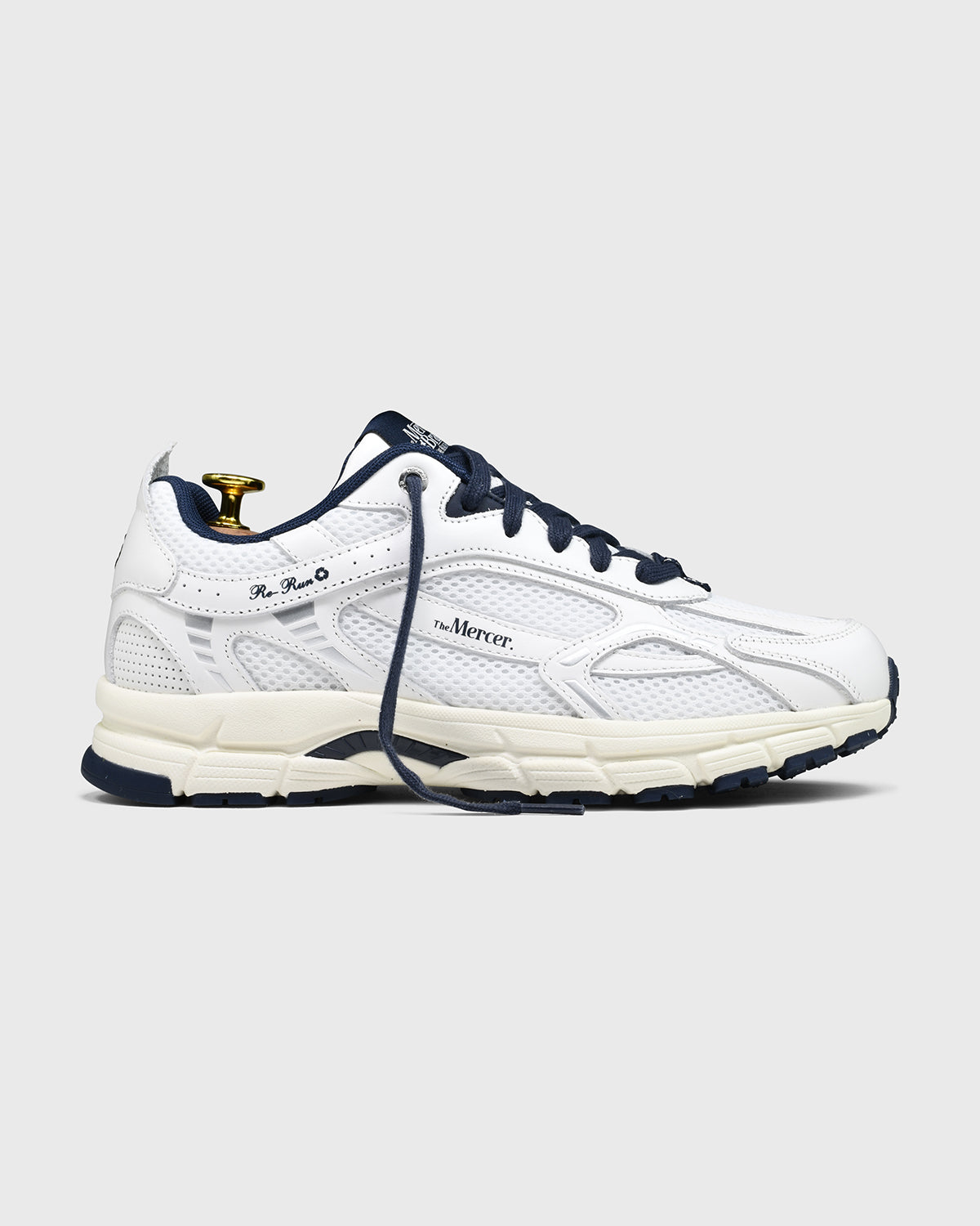 product photo of the re-run nappa off white with navy laces
