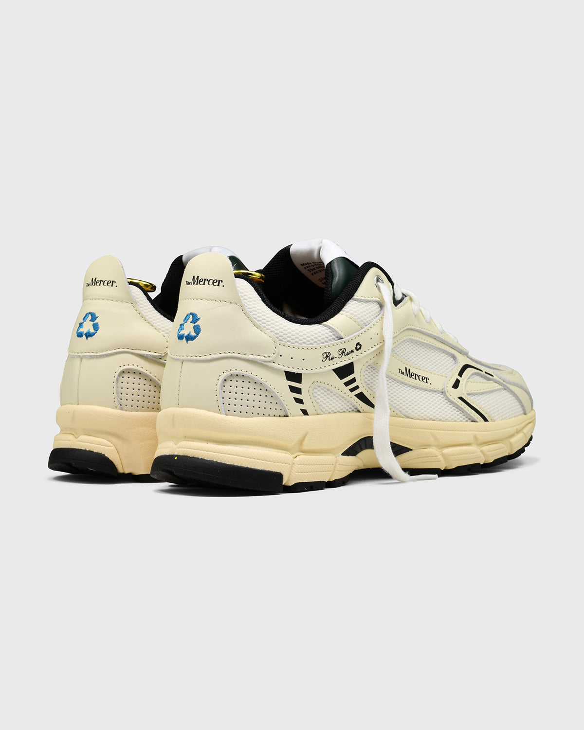 The mercer brand re-run nappa off white sneaker with dark green and black details product photo side