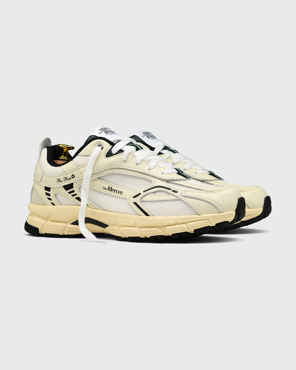 The mercer brand re-run nappa off white sneaker with dark green and black details product photo side