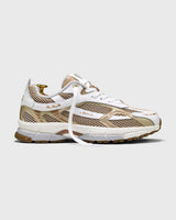 the mercer brand re-run white silver sneaker with gold details product photo side