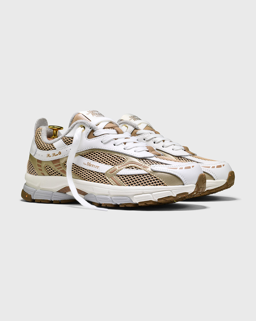 the mercer brand re-run white silver sneaker with gold details product photo side