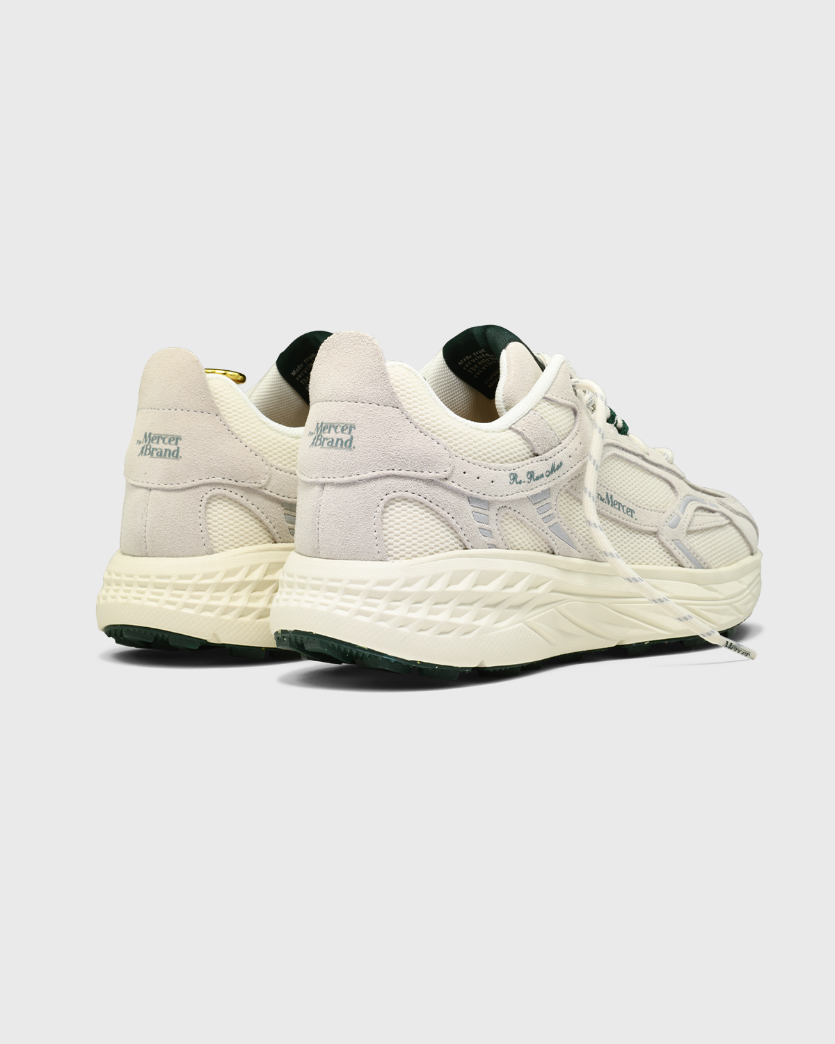 the mercer brand sneaker the re-run max suede off white in combination with dark green details