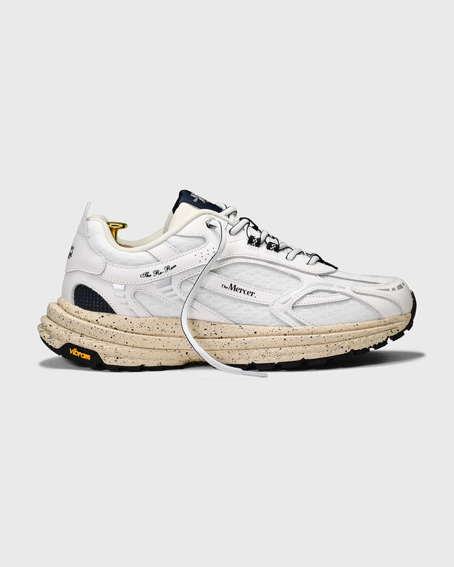 the mercer brand sneaker the re-run Vibram white with off white sole and navy details 