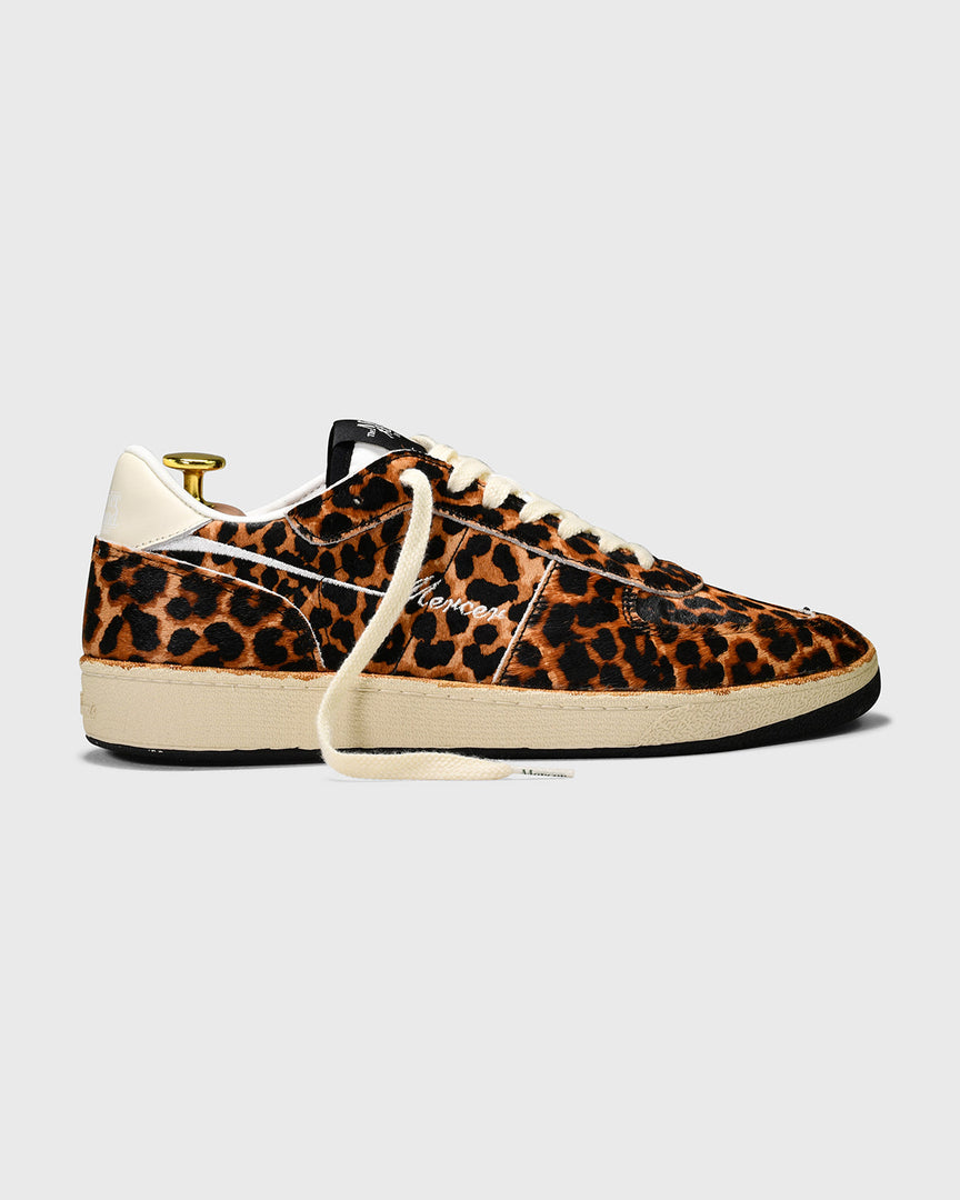 the mercer brand sneaker low leopard with off white outsole called the re-tennis