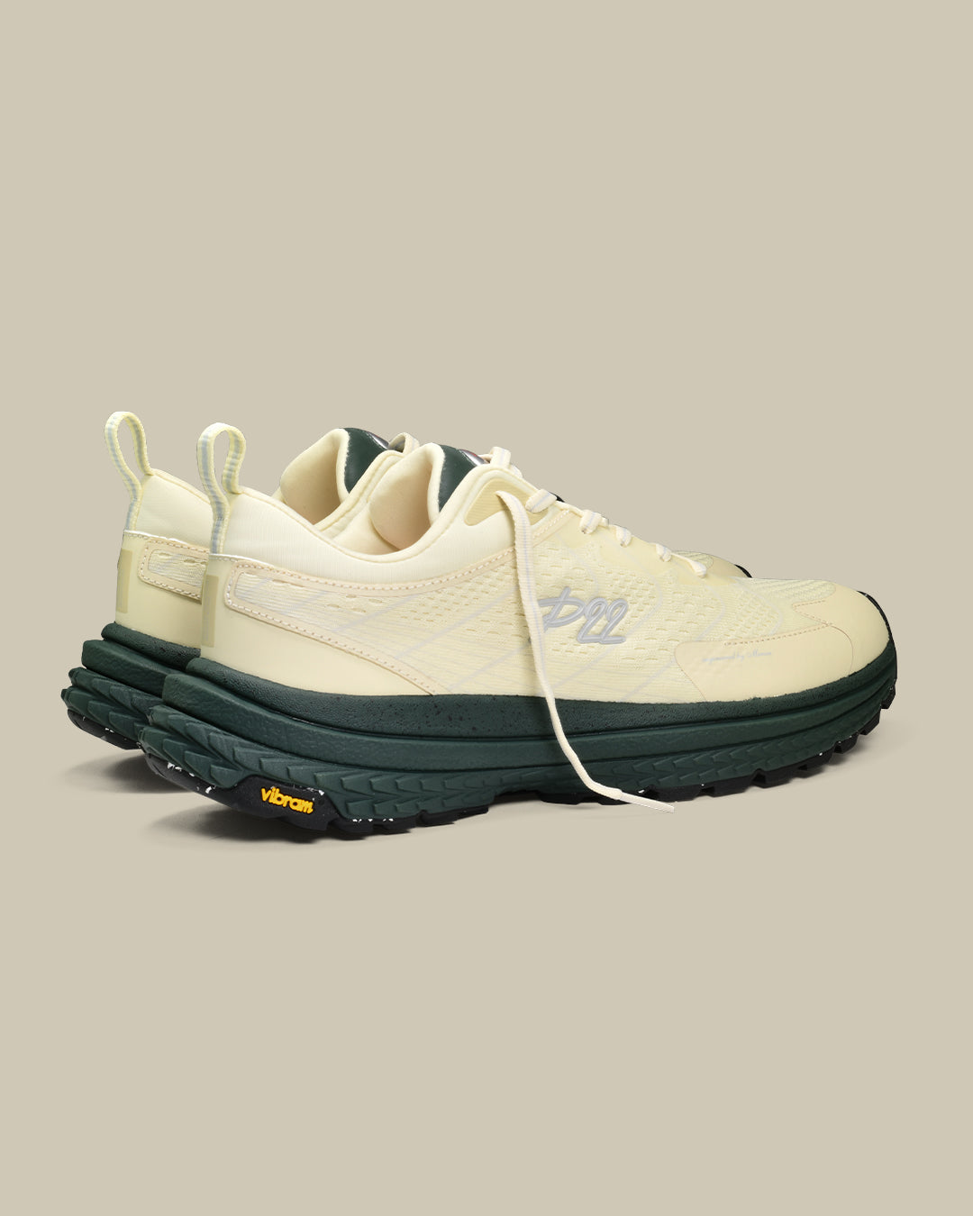 p22 trail sneaker the mercer brand hiking sneaker off white with green details and outsole from Vibram 