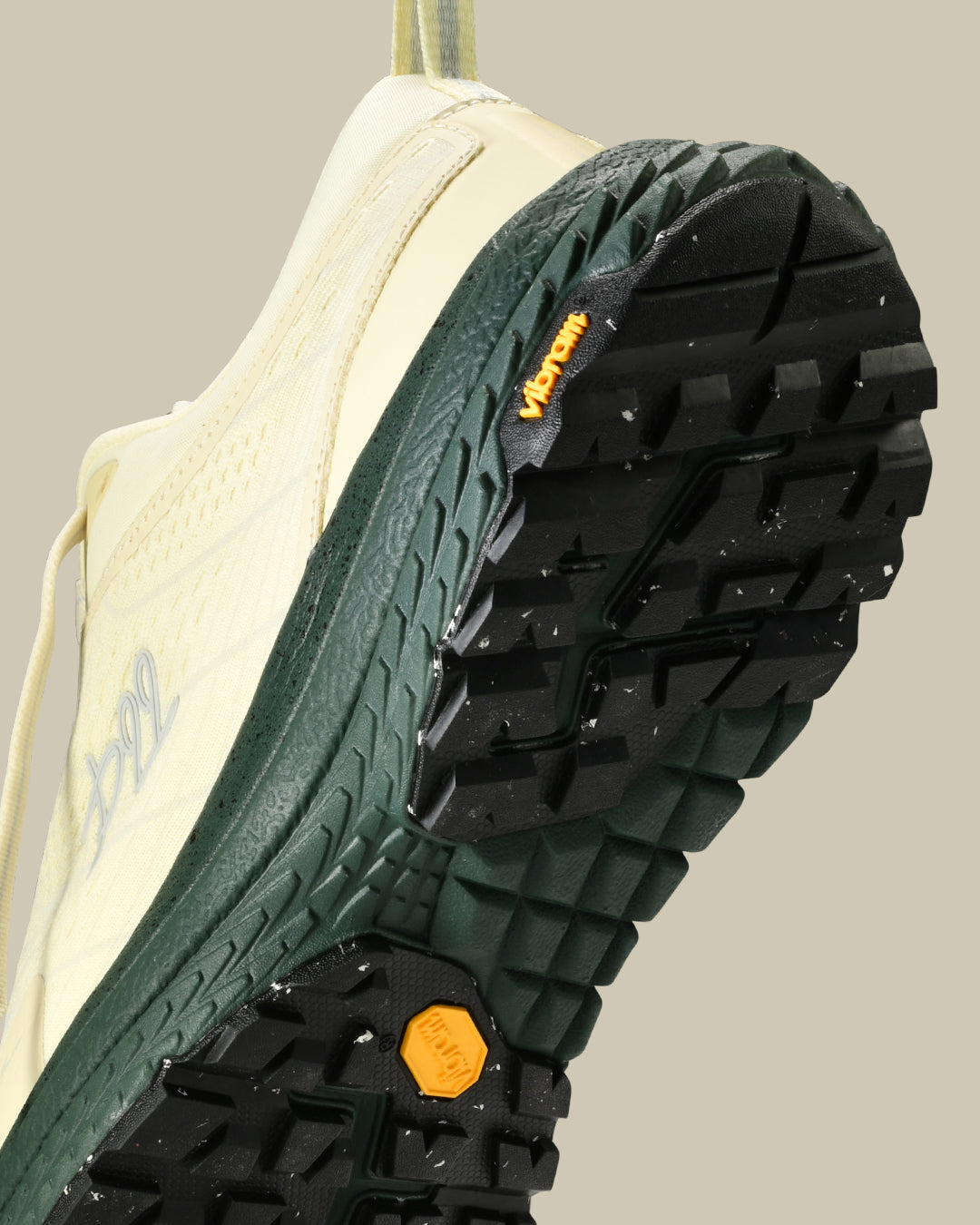 p22 trail sneaker the mercer brand hiking sneaker off white with green details and outsole from Vibram 