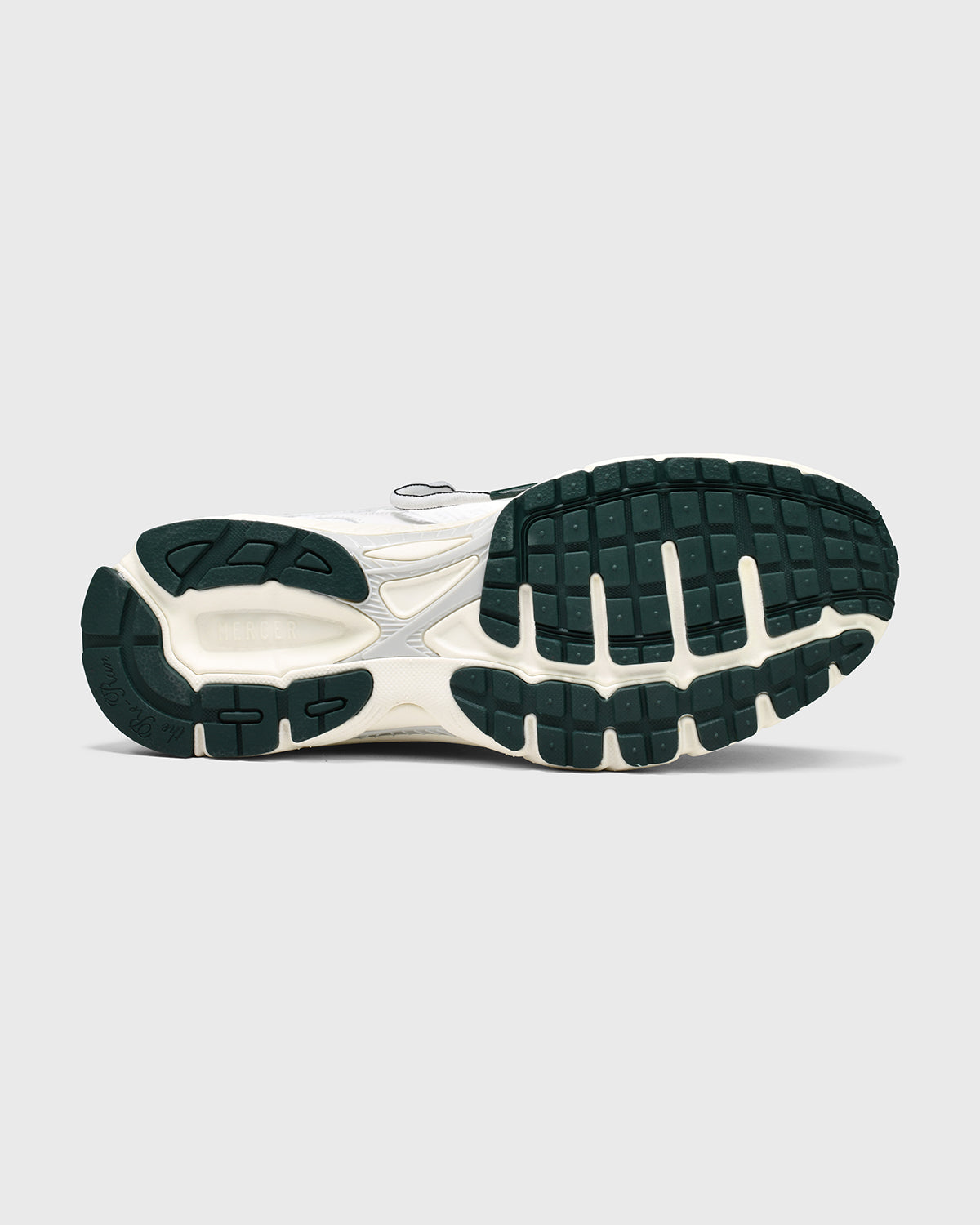 Product photo of the bottom of the sole of The Re-Run Evo in white.