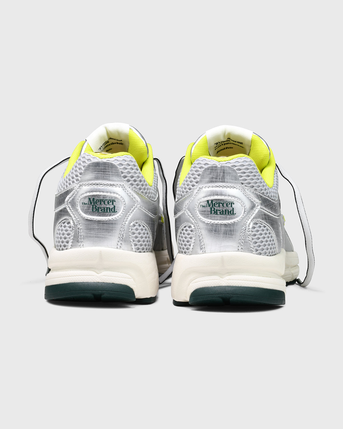 back detail product shot of the mercer brand re-run evo sneaker in silver
