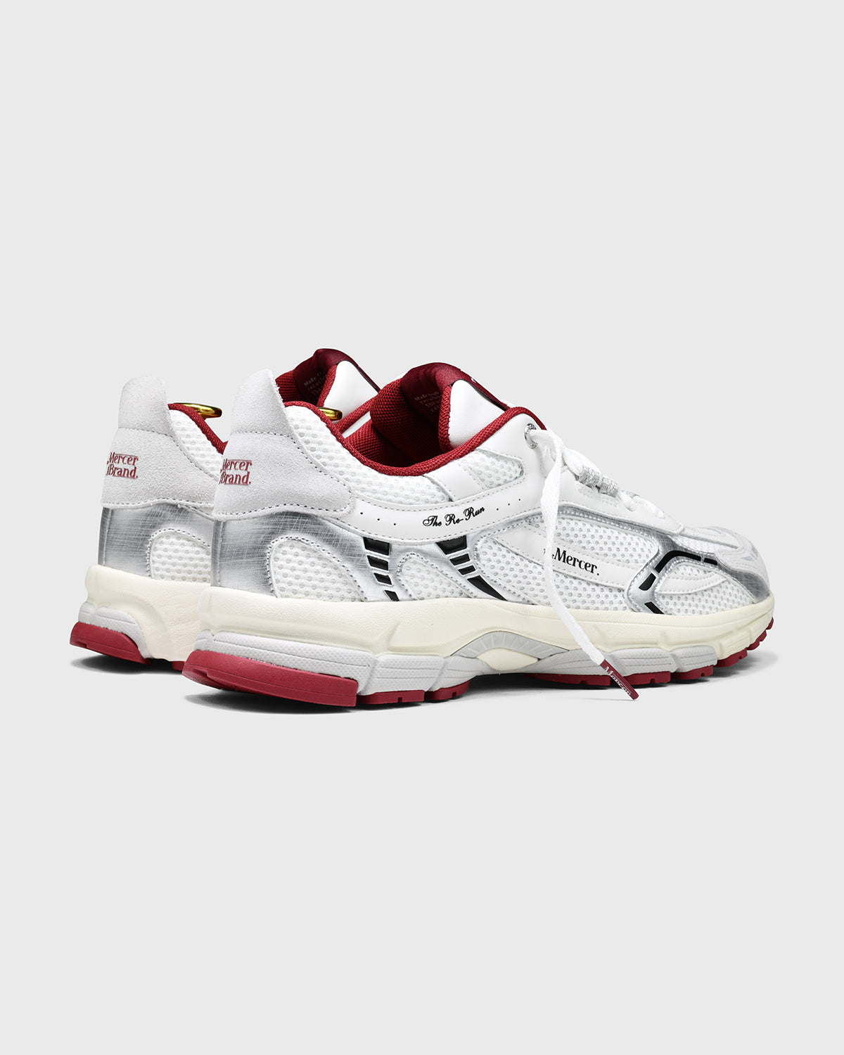 Product photo taken at an angle from the back of The Re-Run White/Silver in White/Red.