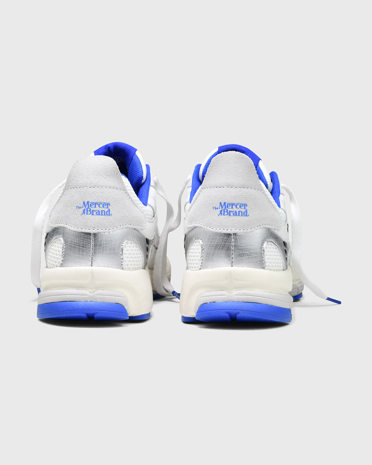 Product photo of the back of The Re-Run White/Silver in White/Blue.