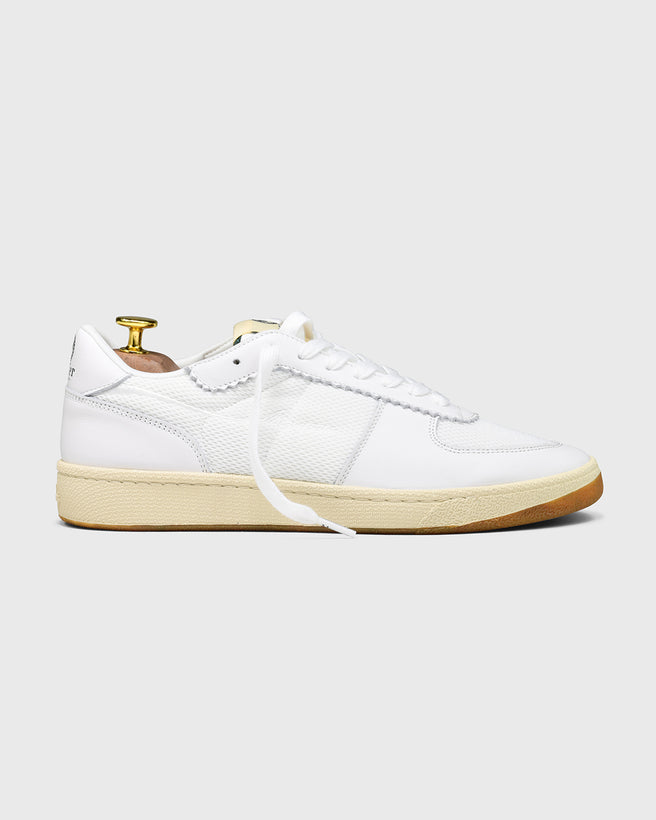 Side view of the Re-tennis in white.