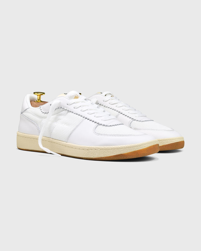 Side view of the Re-tennis in white.