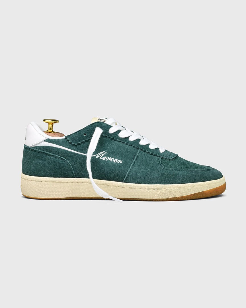 Sideview of The Re-Tennis in green.