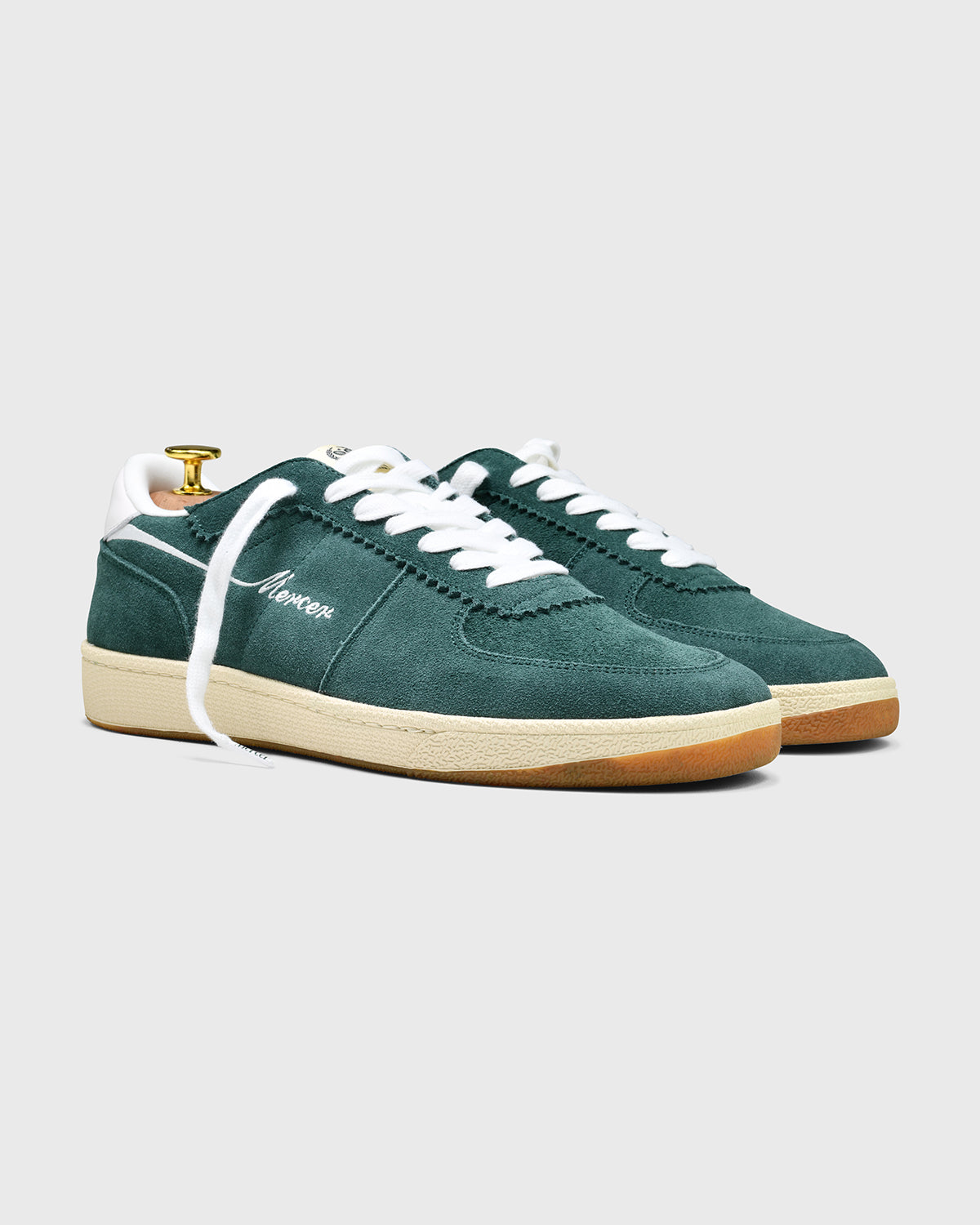 Sideview of The Re-Tennis in green.