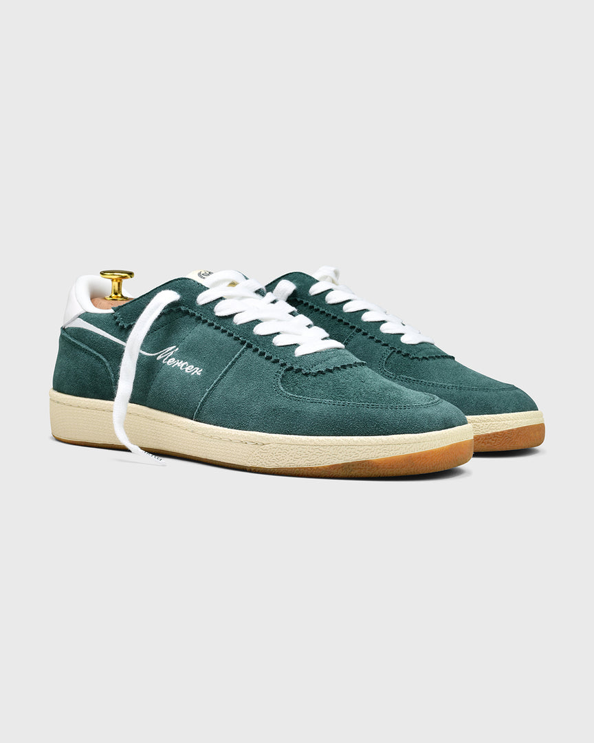 Sideview of The Re-Tennis in green.