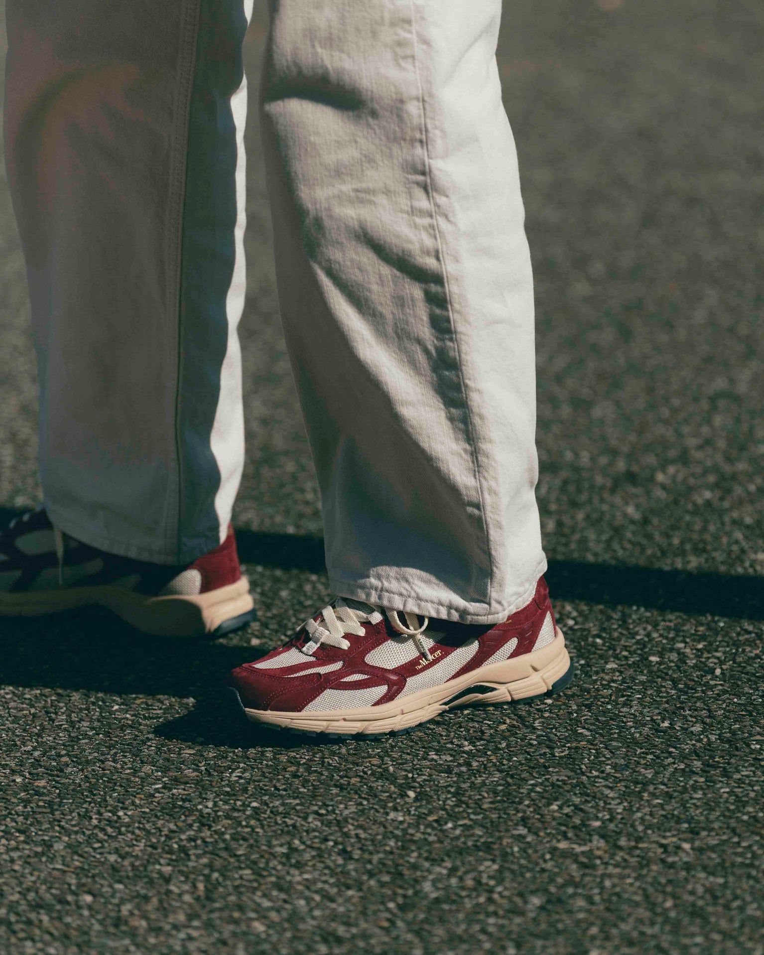 Close up of a woman wearing The Re-Run Desert 2.0 in bordeaux