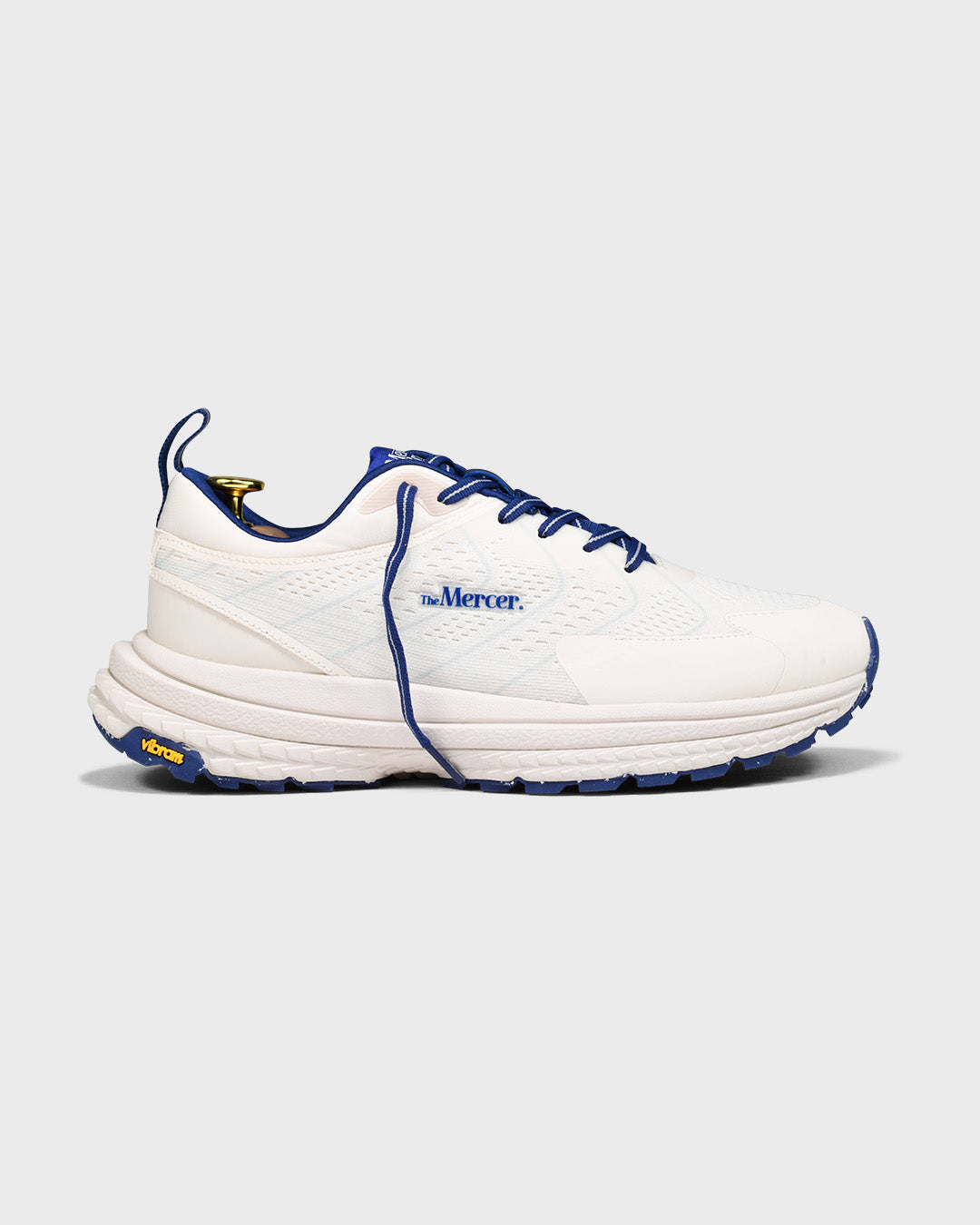 Sideview of The Mercer P22 in white/blue