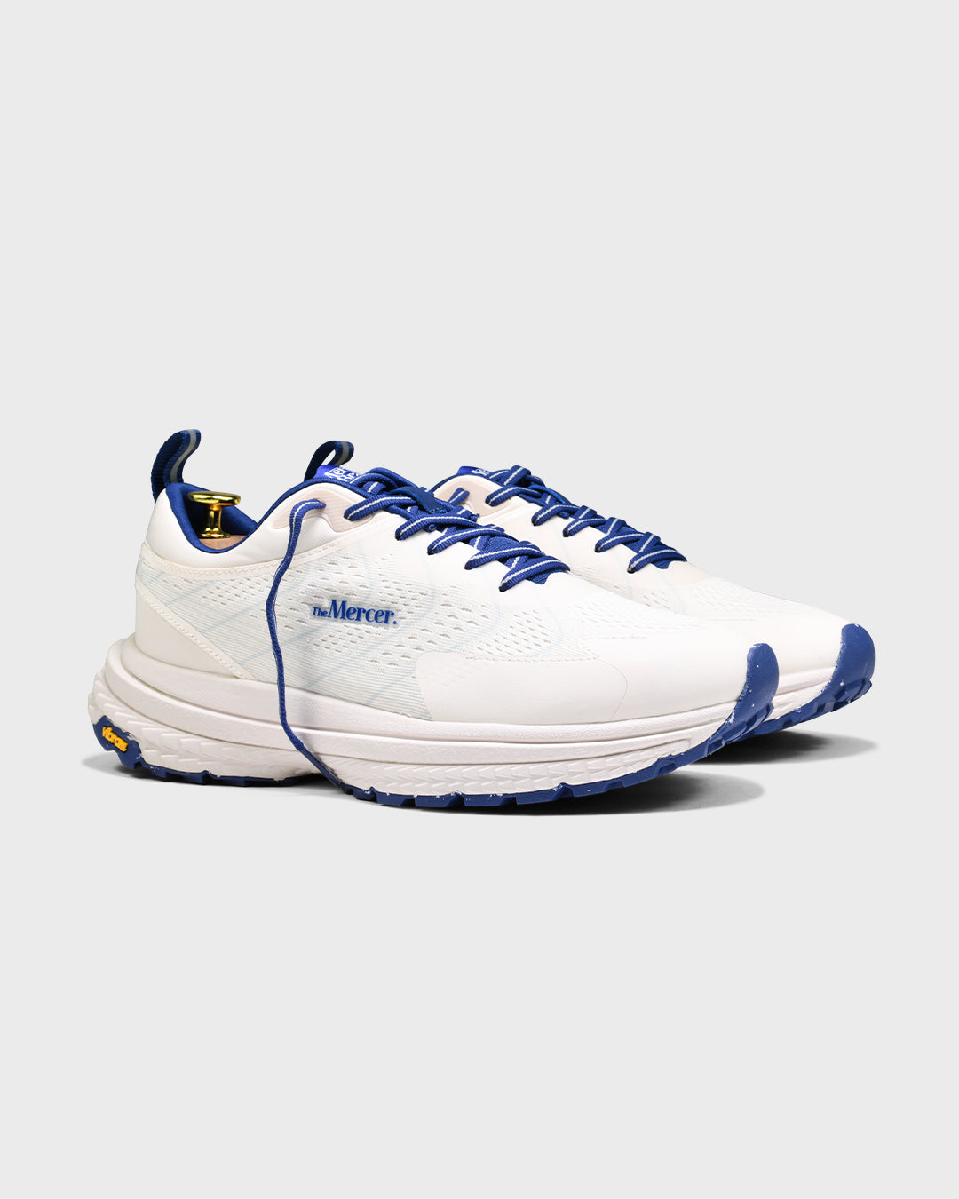 Sideview of The Mercer P22 in white/blue