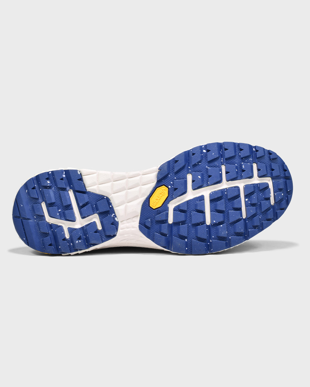 Product photo of the bottom of The Vibram sole of  The Mercer P22 in white/blue.