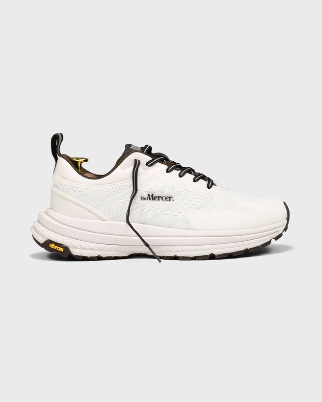 Product sideview of The Mercer P22 in white/brown showing the Vibram sole.