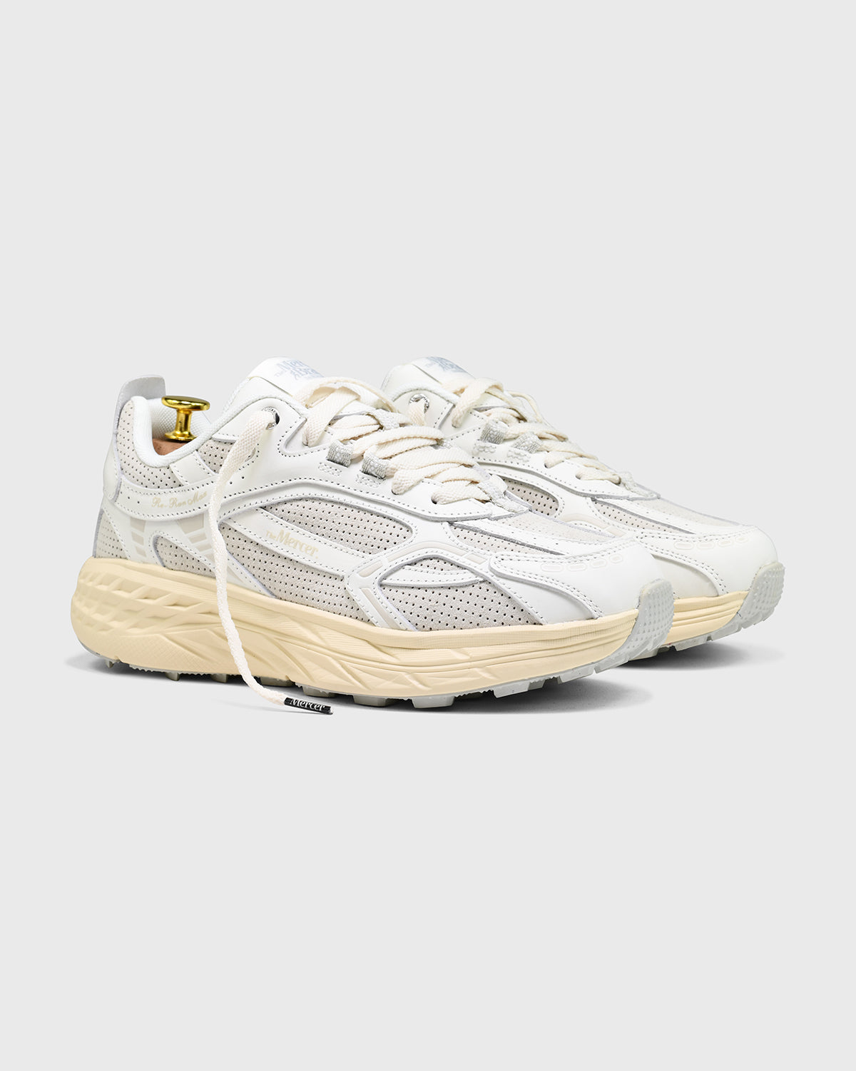 the mercer brand sneaker the re-run max white with perforated leather and off white outsole 