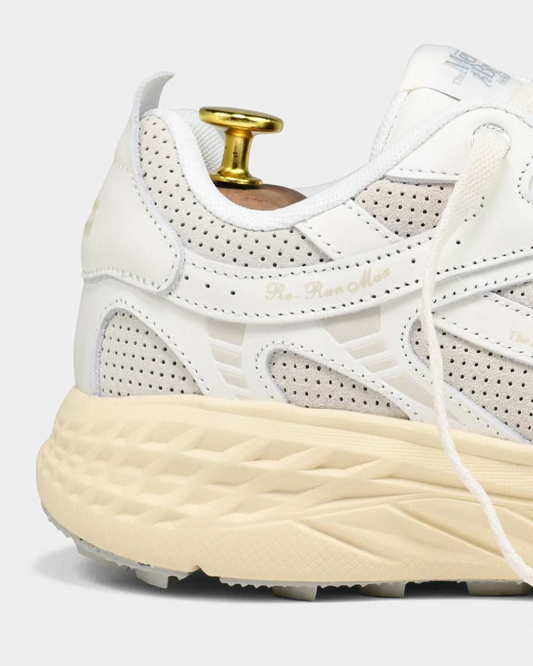 the mercer brand sneaker the re-run max white with perforated leather and off white outsole 