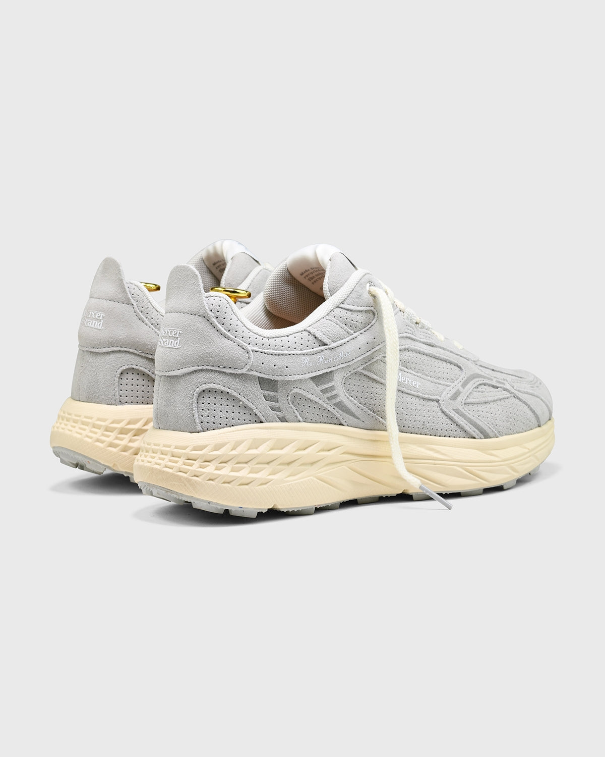 the mercer brand sneaker the re-run max grey with off white sole and perforated leather 
