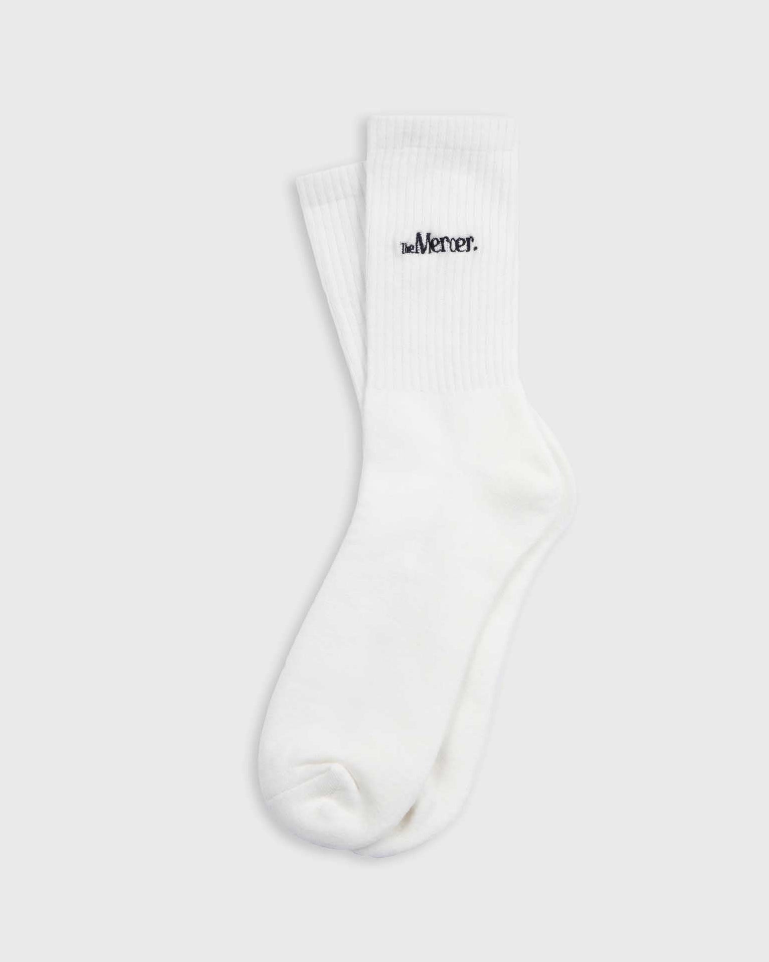 the mercer brand socks white with navy lettering 