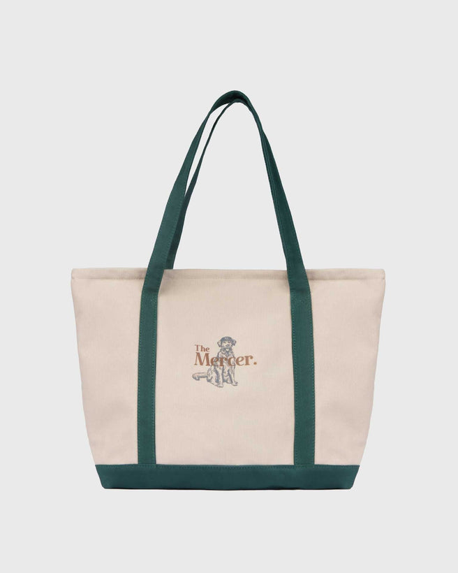 the mercer brand canvas bag with dog and green details 