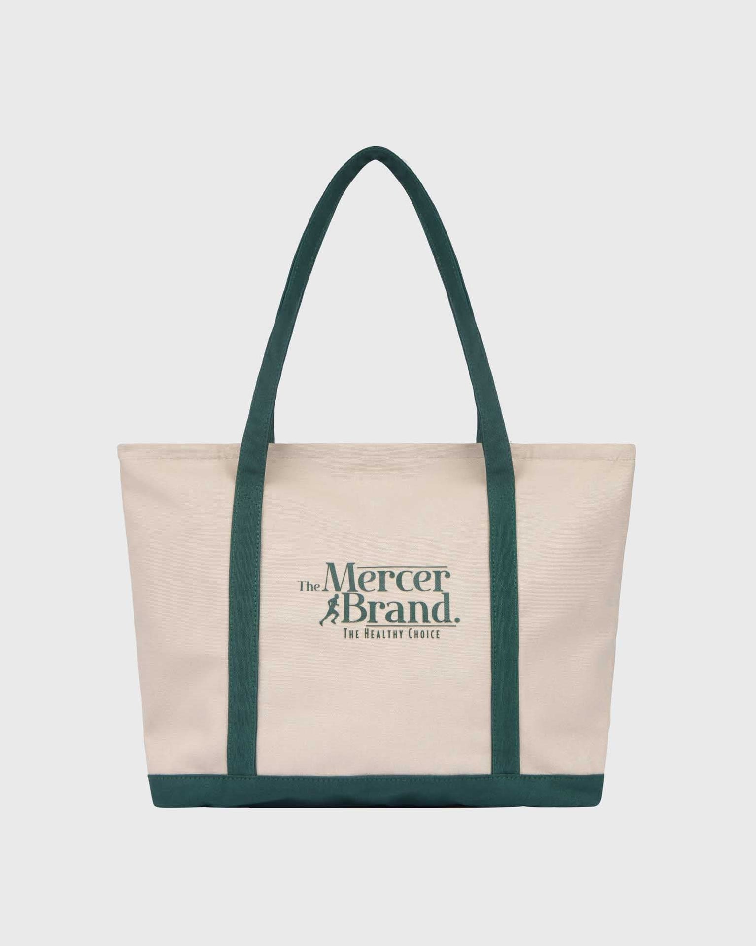 the mercer brand canvas bag with dog and green details 