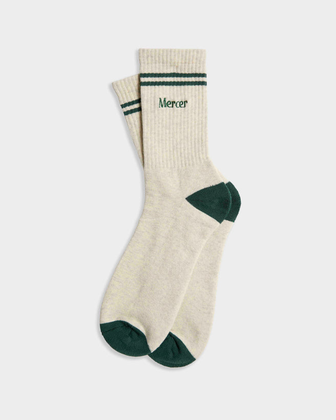 Flat lay of The Mercer Tennis Socks in off white.