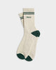 Flat lay of The Mercer Tennis Socks in off white.