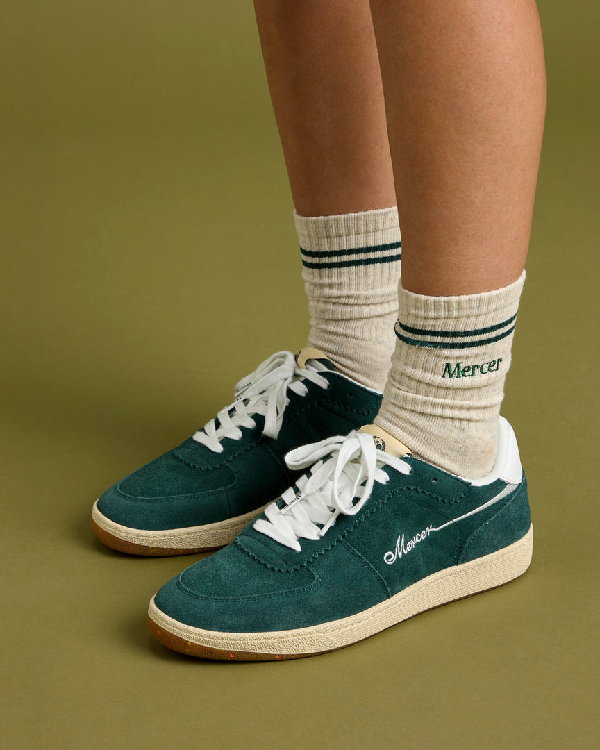 Flat lay of The Mercer Tennis Socks in off white.